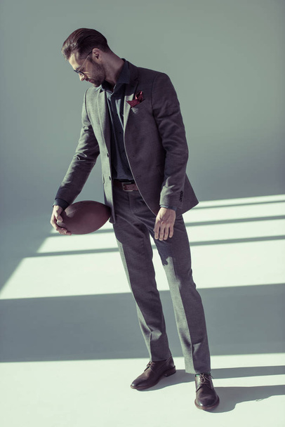 Stylish man with rugby ball - Photo, Image