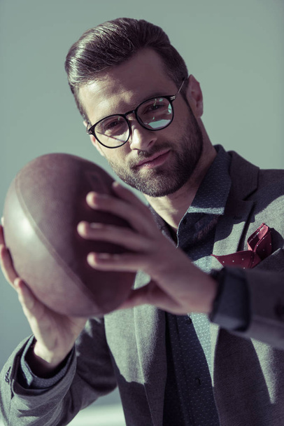 Stylish man with rugby ball - Foto, Imagem