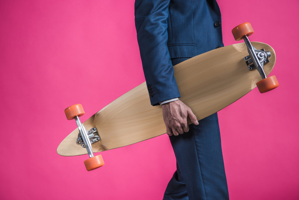 man in suit with skateboard - Φωτογραφία, εικόνα