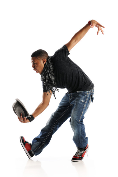 Hip Hop tyyli tanssija hattu kädessään
 - Valokuva, kuva
