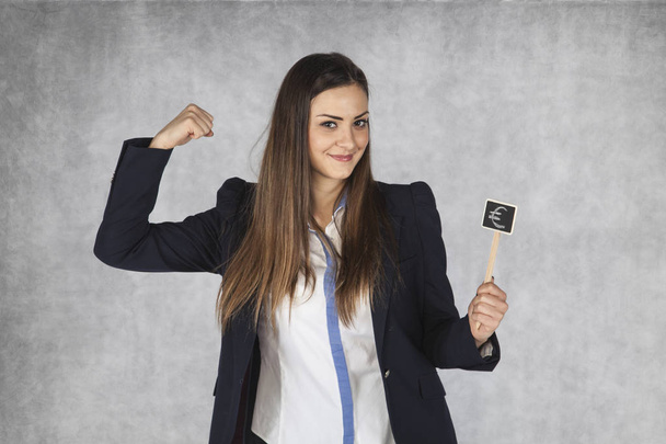 business woman showing the euro currency is strong - Foto, imagen