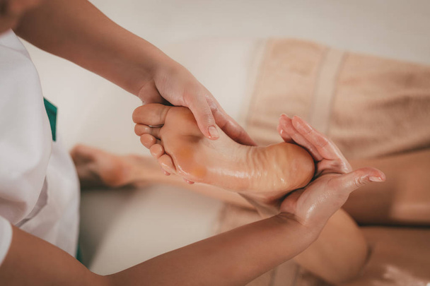 Woman having a Foot Massage - Foto, imagen