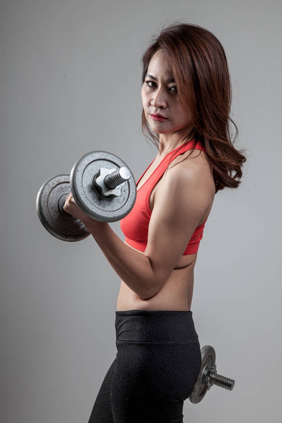 Asian strong healthy  girl  with muscular body - Foto, Bild