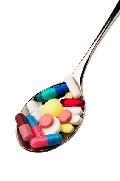 Malattia. Un sacco di pillole in cucchiaio
 - Foto, immagini