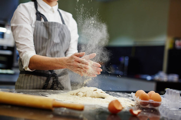 bake-house worker making dough - Фото, зображення