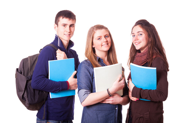 šťastné dospívající studenty na bílém pozadí - Fotografie, Obrázek