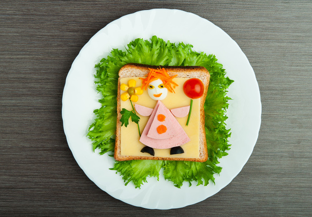 Дизайн їжі. Креативний бутерброд для дитини з малюнком маленької мами
 - Фото, зображення