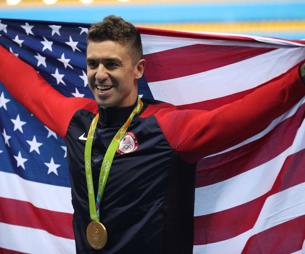 Olympic Champion Anthony Ervin of United States during medal ceremony after Men's 50m Freestyle final of the Rio 2016 Olympics  - Фото, зображення