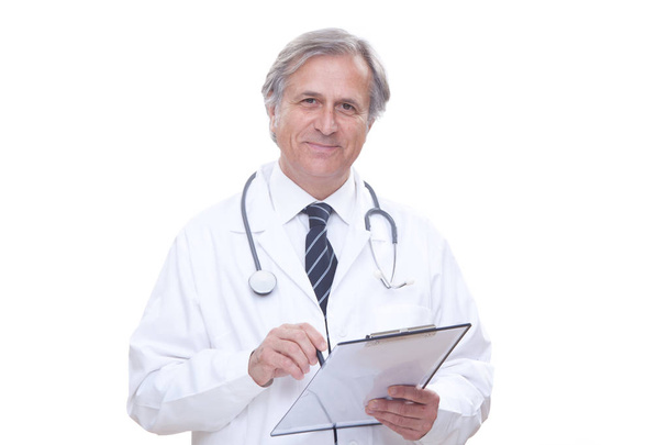 happy senior doctor with stethoscope isolated on white - Foto, afbeelding