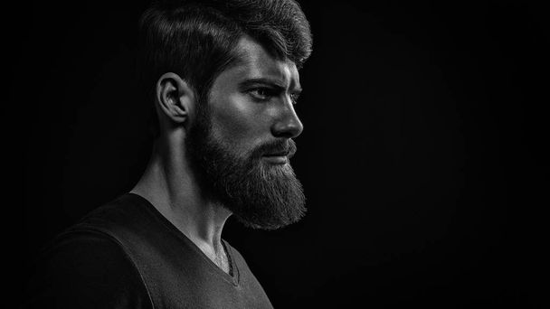 Black and white image of confidence attractive hipster - Фото, изображение