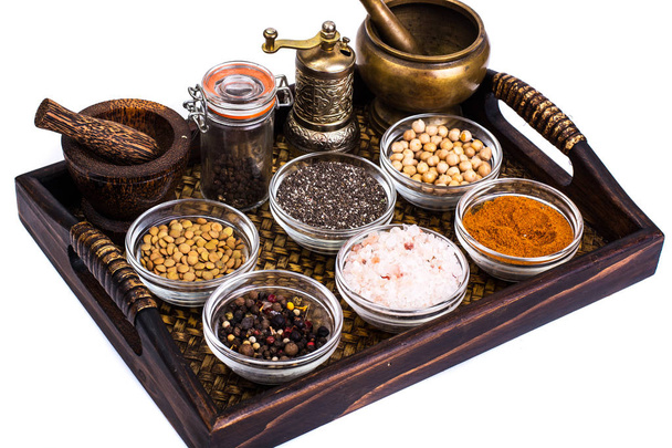Set of spices and seeds of legumes in glass molds on tray - Photo, Image
