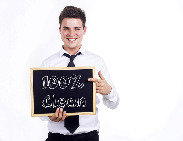 100 % čisté - mladý, usměvavý obchodník hospodářství tabuli s t - Fotografie, Obrázek