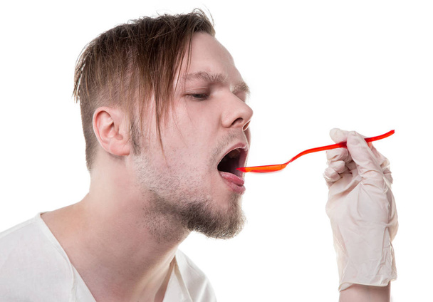 Sick patient eating mixture - Photo, Image