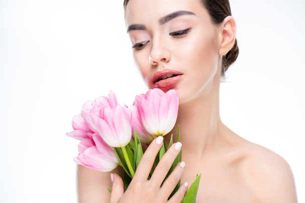 Woman with pink tulips bouquet - Fotó, kép