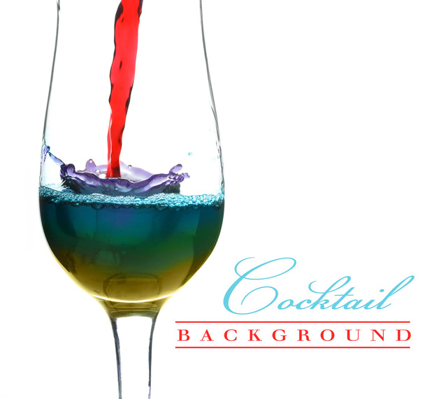 Multicolor cocktail flow in a glass - Foto, Imagem