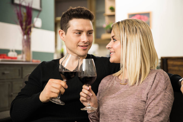 Couple making a toast with wine - Foto, Bild