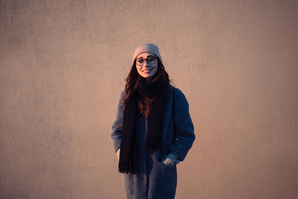 Woman in eyeglasses and scarf looking at camera - Foto, Imagem