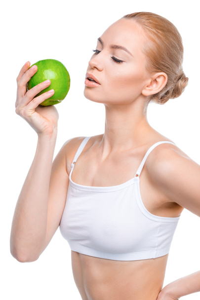 Young woman with apple - Foto, Imagem