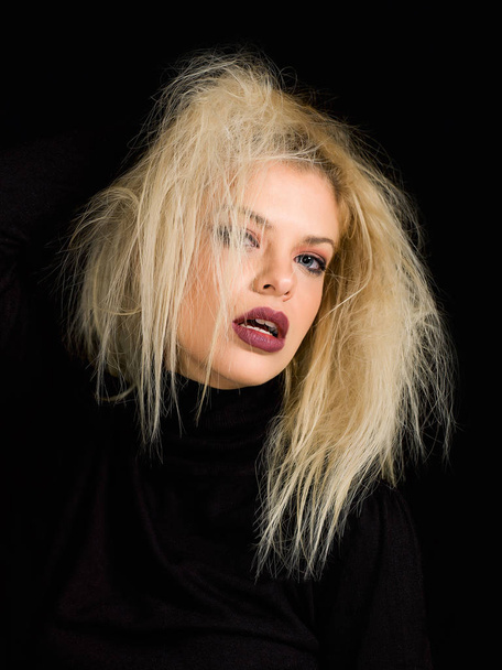 Beautiful girl portrait with blonde messy hair on black background - Фото, зображення