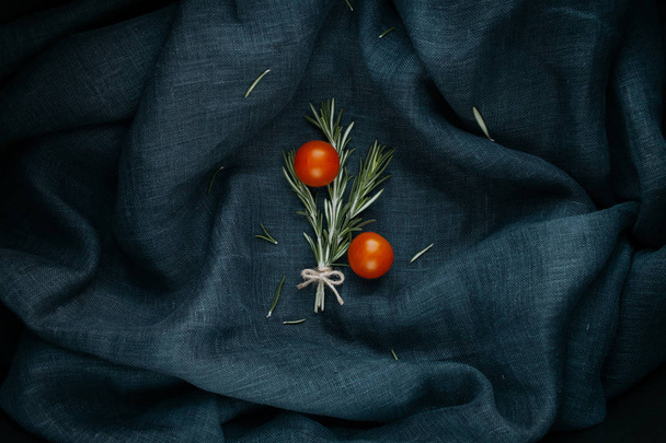 Stylish food. The rosemary and cherry tomatoes composition. - Valokuva, kuva