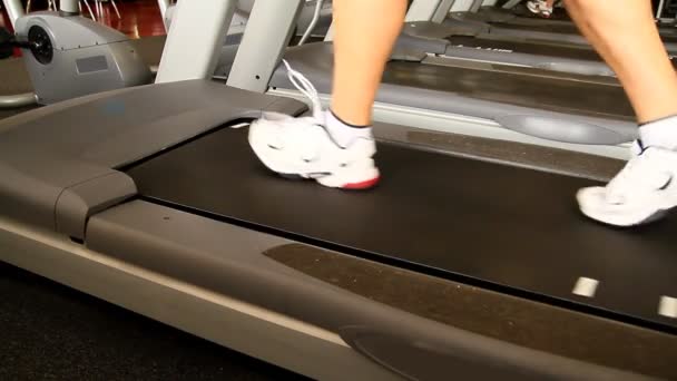 A man walks on a treadmill - Footage, Video