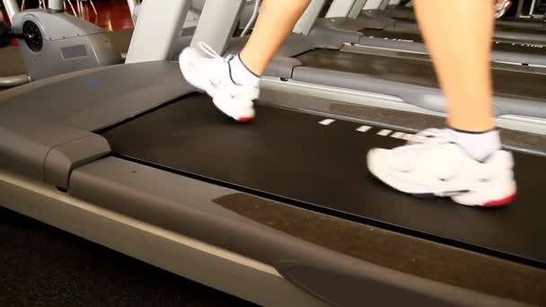 A man walks on a treadmill. - Footage, Video