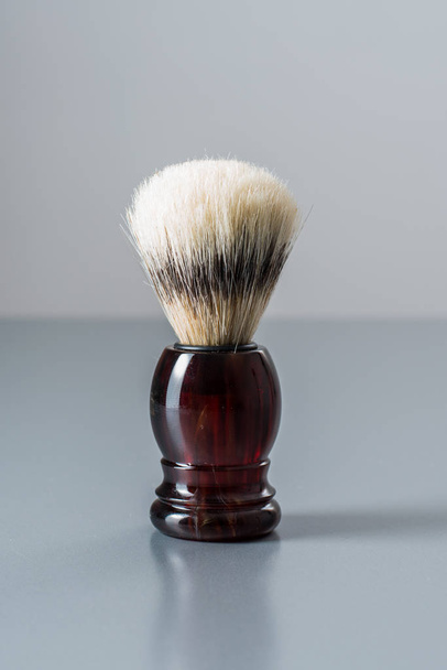 Shaving brush isolated on grey background. - Foto, Imagem