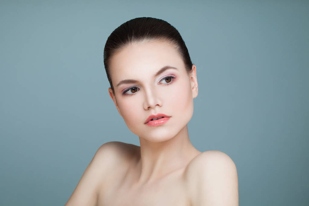 Spa Model Woman with Healthy Skin on Blue Background. Spa Beauty - Фото, зображення