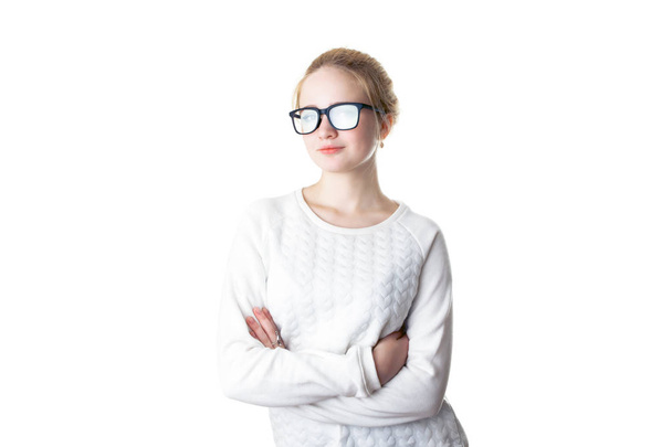 Portrait of charming woman hipster wearing blank sweater and eye glasses. White grunge wall with cracks background - 写真・画像