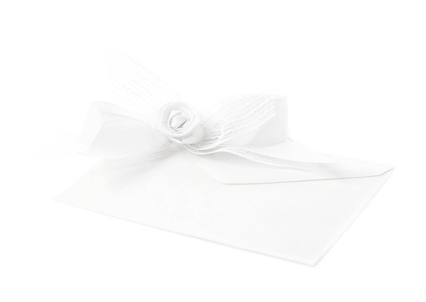 Paper envelope decorated with the bow - 写真・画像