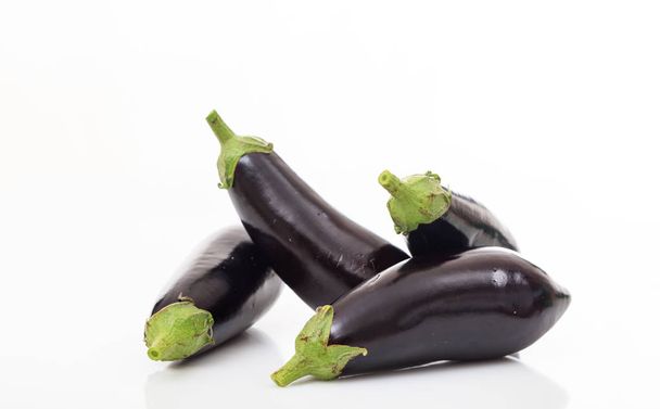 Eggplants on white background - Photo, Image