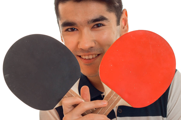 nice young brunett man playing ping-pong isolated on white background - Φωτογραφία, εικόνα