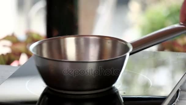 Saucepan on stove. - Footage, Video