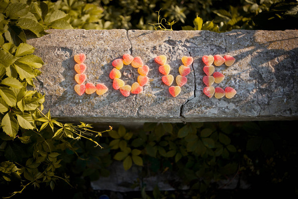 The inscription "love" of the jam. - Foto, afbeelding