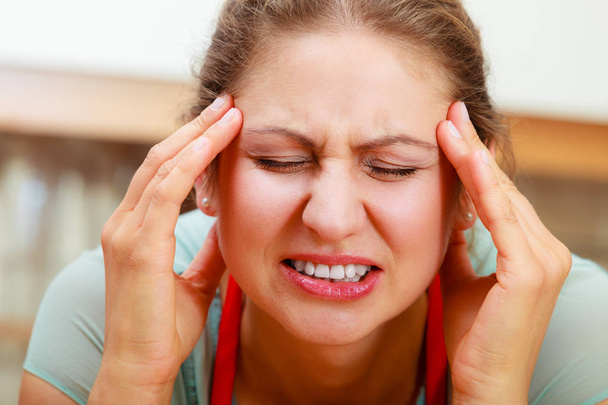 Woman suffering from headache migraine pain. - Photo, Image