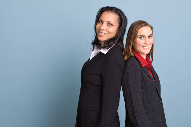 Happy confident businesswomen smiling at work - Zdjęcie, obraz