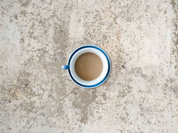 Top view of a cup of coffee on table. - Fotografie, Obrázek
