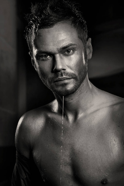 Portrait of man in shower - Photo, Image