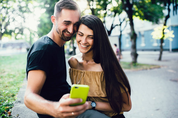 Beautiful young couple makes selfie - Photo, Image