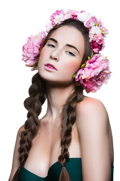 Beautiful girl with floral headphones - Фото, изображение