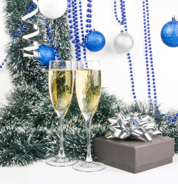 Blue Christmas composition with champagne and present - Фото, изображение