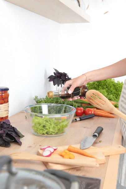 Fresh vegetables on the cutting board are falling in the pot, concept of cooking - Foto, imagen