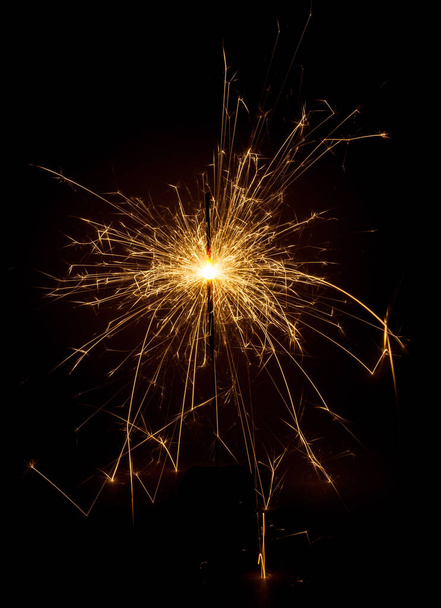 sparkler on black background - Фото, зображення