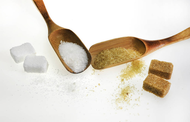 Azúcar moreno y blanco - Foto, imagen