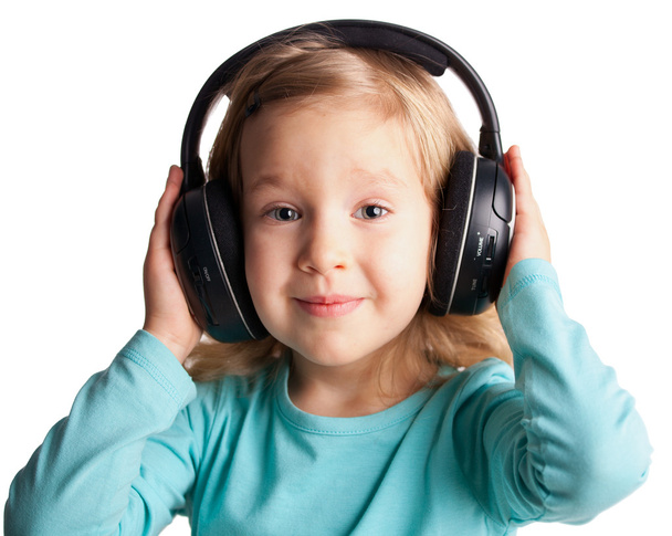 Little girl in headphones - 写真・画像