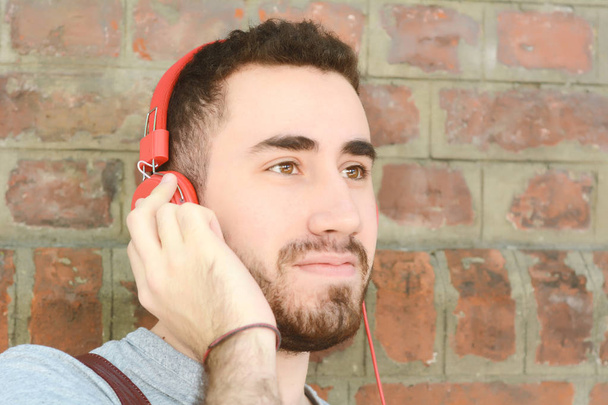 Man listening music with headphones. - Foto, Imagen