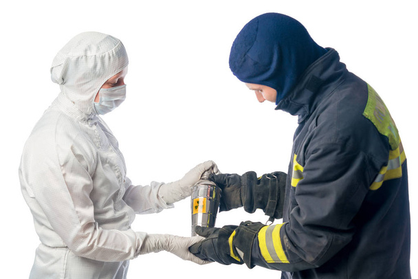 Fireman sends container with radiation chemist in the laboratory - Photo, Image