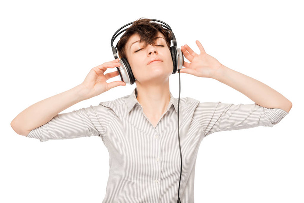Horizontal portrait of a woman with headphones on white backgrou - Foto, imagen
