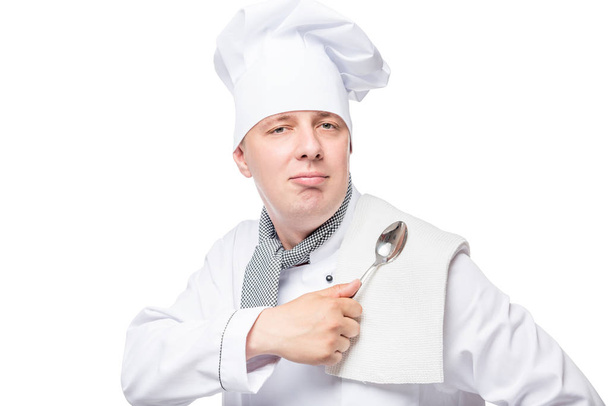 erfolgreicher Koch mit Handtuch und Löffel auf weißem Hintergrund - Foto, Bild