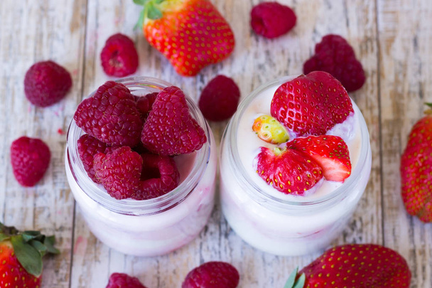 Two jars homemade yogurt with berries - Photo, Image